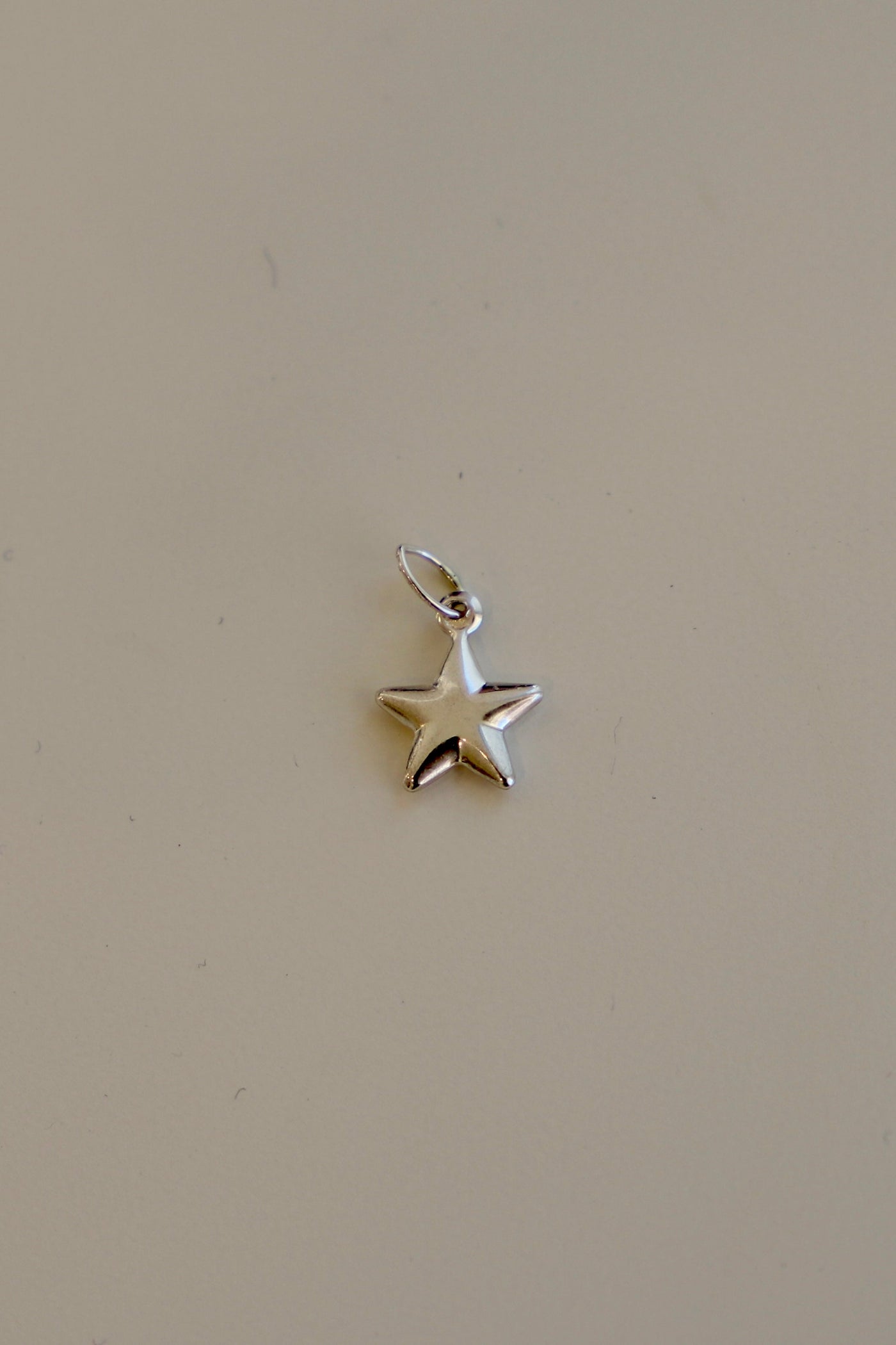 SILVER STAR CHARM