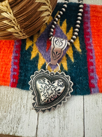 Handcrafted Sterling Silver Heart Concho Pendant by Leander Tahe