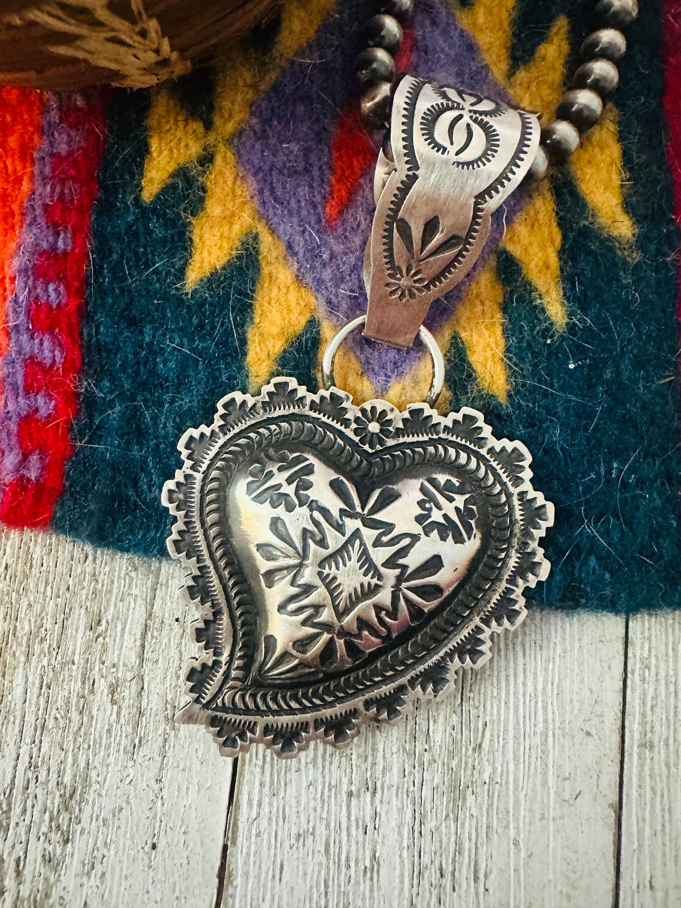 Handcrafted Sterling Silver Heart Concho Pendant by Leander Tahe