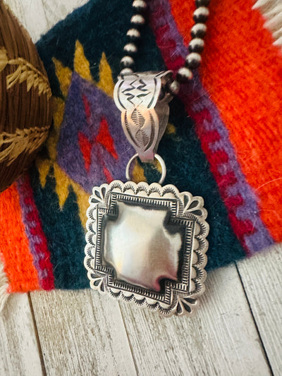 Handcrafted Sterling Silver Cross Concho Pendant by Leander Tahe