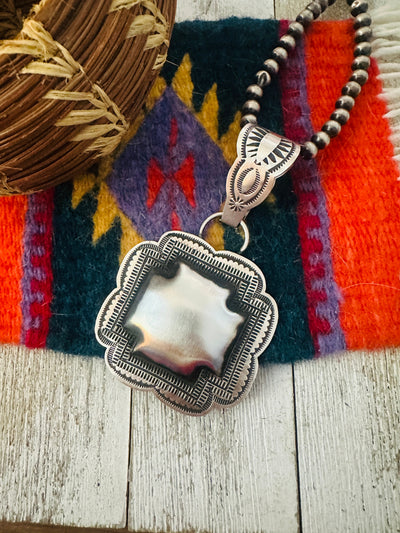 Handcrafted Sterling Silver Cross Concho Pendant by Leander Tahe