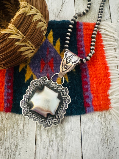 Handcrafted Sterling Silver Cross Concho Pendant by Leander Tahe