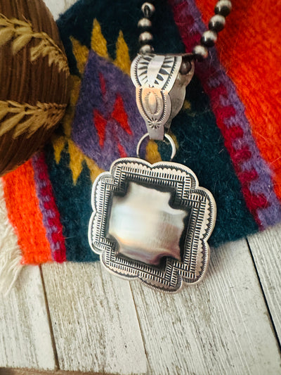 Handcrafted Sterling Silver Cross Concho Pendant by Leander Tahe
