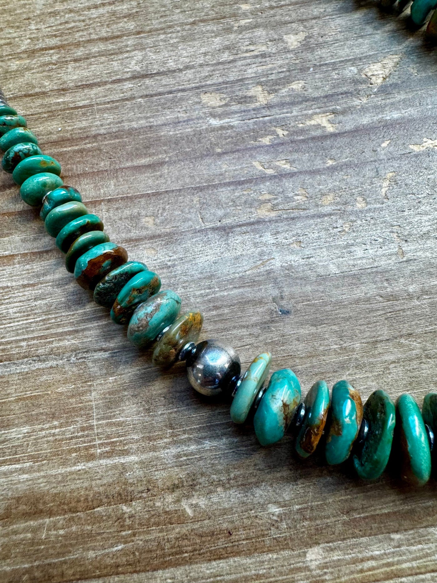 22 inch greener graduated turquoise necklace with Sterling silver pearls