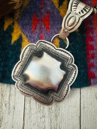 Handcrafted Sterling Silver Cross Concho Pendant by Leander Tahe
