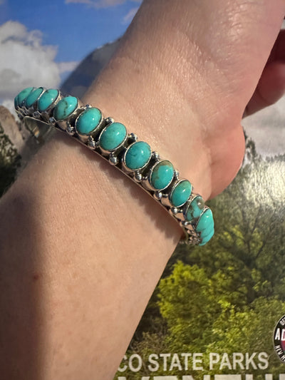 Beautiful Handmade Turquoise Sterling Silver Bangle By Dan Dodson lighter tones