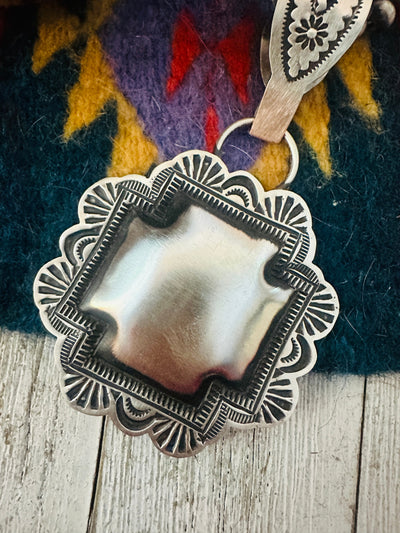 Handcrafted Sterling Silver Cross Concho Pendant by Leander Tahe