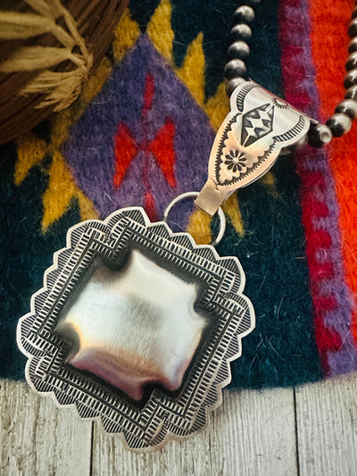 Handcrafted Sterling Silver Cross Concho Pendant by Leander Tahe