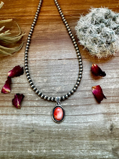 Oval Pendant - sterling silver with orange spiny