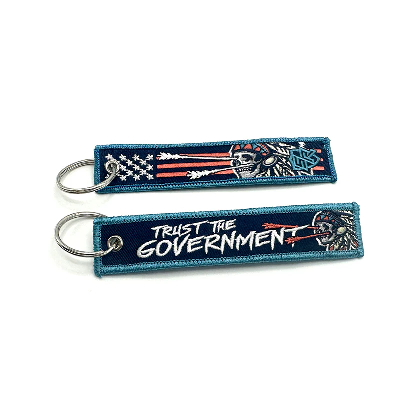 Trust The Government Jet Tag Keychain