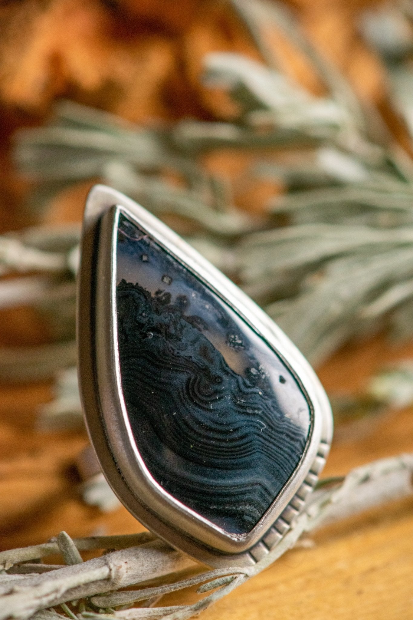 PSILOMELANE STRIKE RING